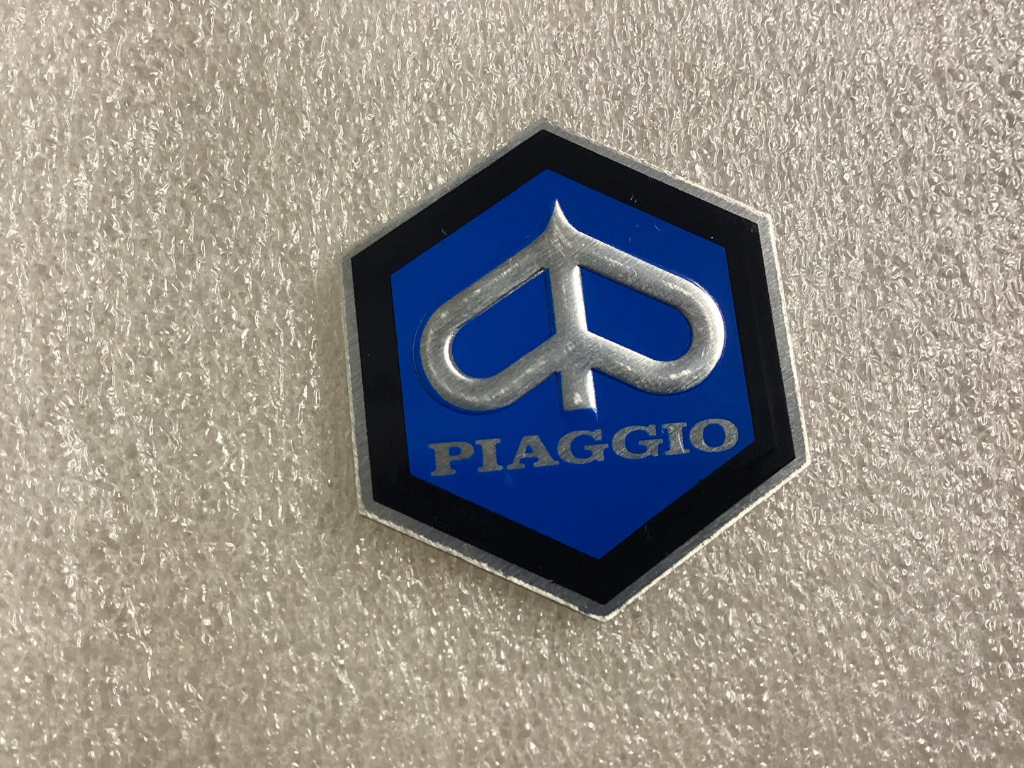 Horncast Badge Stick on Piaggio Medium 36mm x 31mm.